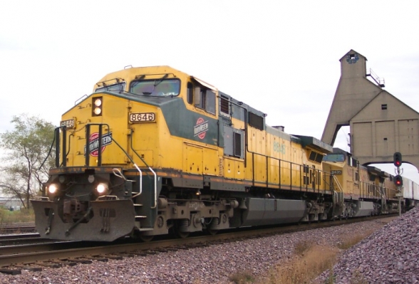 C44-9W  8646  Dekalb IL
Rainy October 24, 2003 found CNW 8646 leading a westbound stacker under  the coal tower at Dekalb, IL.  Photo by Jerry Krug.
Keywords: Dekalb