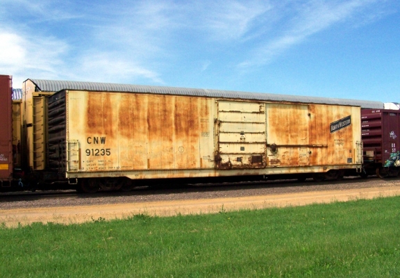Box Car  CNW  91235  Janesville, WI
Despite years of UP ownership, this auto parts box car appears unaltered from C&NW days at Janesville, WI on June 4, 2009.  Photo by Jerry Krug.
Keywords: Box car Janesville