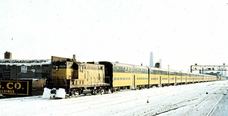 Suburban Coaches  GP7 1644  Chicago, IL
On a cold winter day in Chicago, GP7 1644 shuttles 13 bi-level coaches between the passenger terminal and the coach yard.  Art Harnack photo, 2-1978.  Submitted by J. H. Yanke.
Keywords: GP7 1644 Chicago