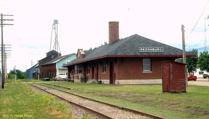 Depot  Reedsburg, WI
Reedsburg is located west of Baraboo on the line to Elroy.  The depot is still standing and is used as a bike rental shop.  Jim H. Yanke photo, 6-16-1997.
Keywords: Depot Reedsburg
