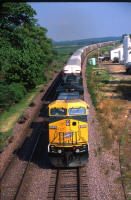 C44-9W  8639  Union Grove, IL
General Electric and General Motors engines team up to move autos eastward through Union Grove, Illinois on 7-7-96.  C44-9 # 8639 and SD-40-2 #6931 are doing the honors today.  Photo by R J Williams
Keywords: C-44-9W 8639 Union Grove, Illinois