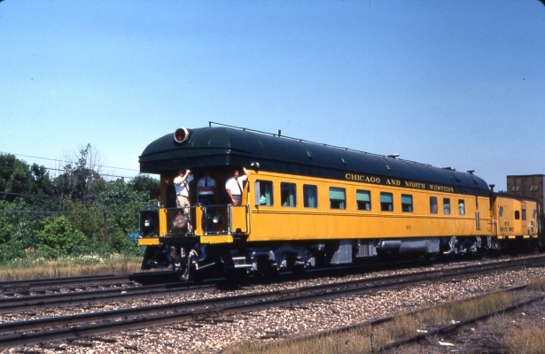 Business Car  401  West Chicago, Ill.
CNW Observation car #401 is on the rear end of an eastbound piggyback train today as it rolls eastward through West Chicago, Illinois, on a sunny August day in 1981. Photo by R J Williams
Keywords: Business car 401 West Chicago