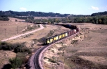 Six units wind through the Sand Hills east of Chadron, Ne. with westbound train PRBFA on 9-17-85  Photo by RJW.jpg