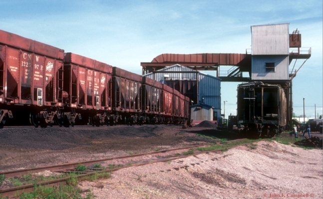 Iron Ore Dumper  Escanaba, MI
C&NW Iron Ore Dumper facilities at Escanaba, MI on 5/16/1984... CN/WC has recently installed a Bottom Dumper in the open space between the two structures in this view and began using this feature 1/2005... Photo by John F. Campbell...
Keywords: Iron Ore Dumper Escanaba Michigan