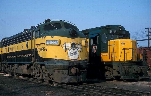 F7  4098A
F7A #4098A and new GP-30 #815 pose side by side at an unknown location during October of 1963.  Photographer unknown, Mike Guss collection
Keywords: F7 4098A