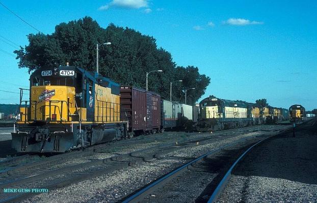 GP38-2  4704  St. Paul, MN
4704, 6646 and 4709 line up at the former CGW Belt Yard in St. Paul, MN on 8-5-92.  Mike Guss photo
Keywords: GP38-2  4704  St. Paul