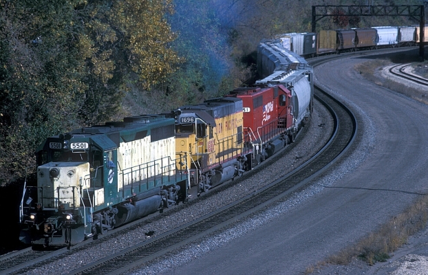 GP40  5501  St. Paul, MN
GP40 #5501 leads Union Pacific GP15-1 #1696 and CP Rail (former Soo Line) SD40 #751 through Westminster Interlocking at St. Paul, MN on 10-10-98.  Mike Guss photo.
Keywords: GP40 5501 St. Paul