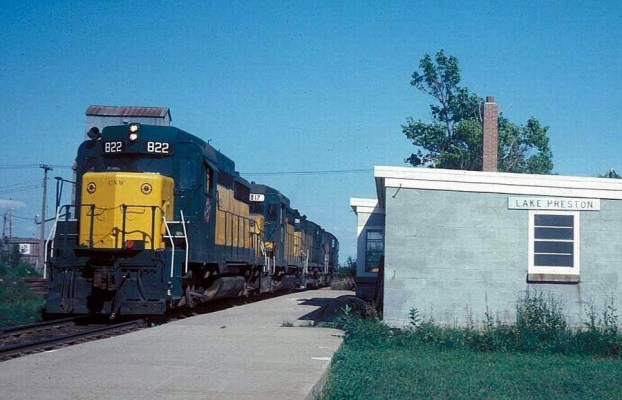 GP30  822  Lake Preston, MN
In near fresh paint, GP30 #822 and 817 are at Lake Preston, SD on 8-18-80.  During the seasonal grain rushes out in South Dakota and southern Minnesota, the normal power on the 'Alco Line' was often beefed up with straglers from other divisions. GP30's and non-slug GP35's seemed to be the units of choice when the power desk was forced to throw the Central Division a bone.  Mike Guss photo
Keywords: GP30 822  Lake Preston, MN