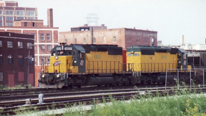 SD40-2  6829  Kansas City, MO
SD40-2's 6829 and 6853  lead a westbound freight through downtown Kansas City, MO. June 1997.  Photo by Bill Hakkarinen.
Keywords: SD40-2  6829  6853  Kansas City, MO