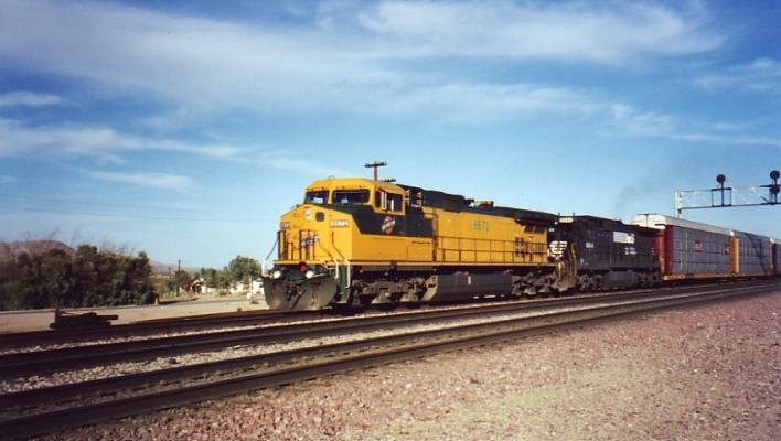 C44-9W  8672  Daggett, CA
8672 leads its train in the company of an NS unit at Daggett, CA, on the joint UP-AT&F line.  September 24, 1995  Photo by Bill Hakkarinen.


Keywords: C44-9W