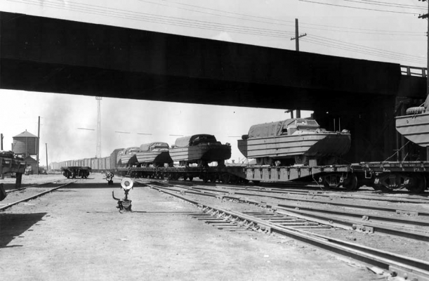 Proviso, IL
Army �ducks� are being transported through Proviso Yard in 1944.  C&NW photo.  C&NW Historical Society Archives collection.


Keywords: Proviso, IL