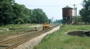 MOW rail car passing water tower and turntalble at Highland Park.jpg